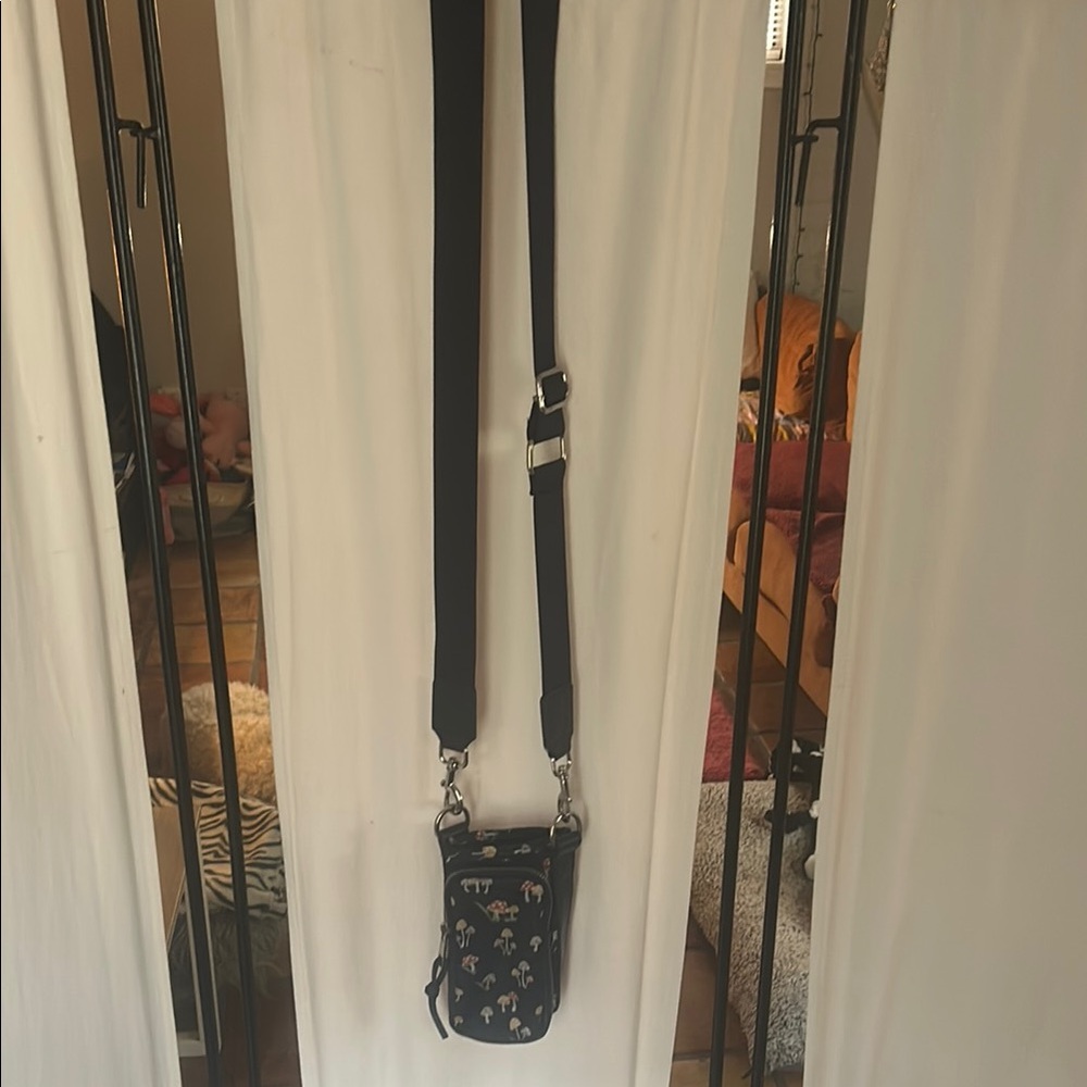 Chic Black Crossbody Bag with Elephant Design
